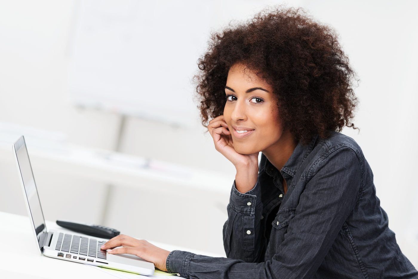 IT professional working on a laptop